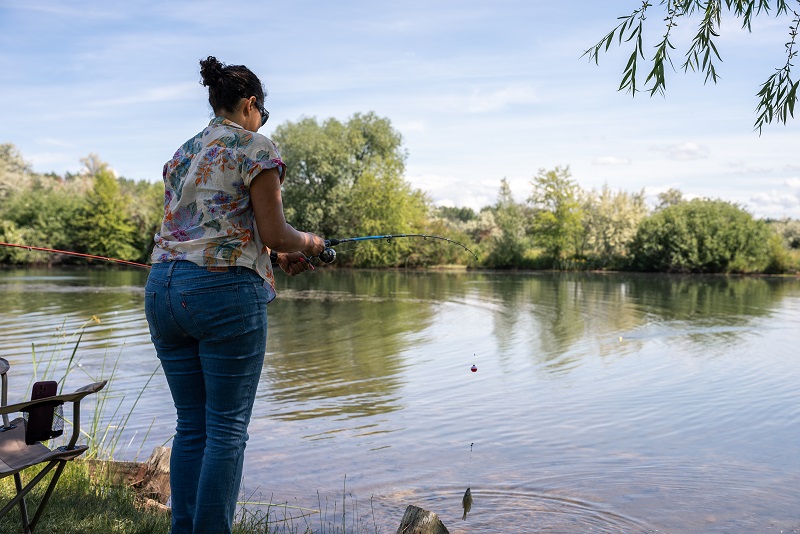 Woman fishing WAFWA/RBFF